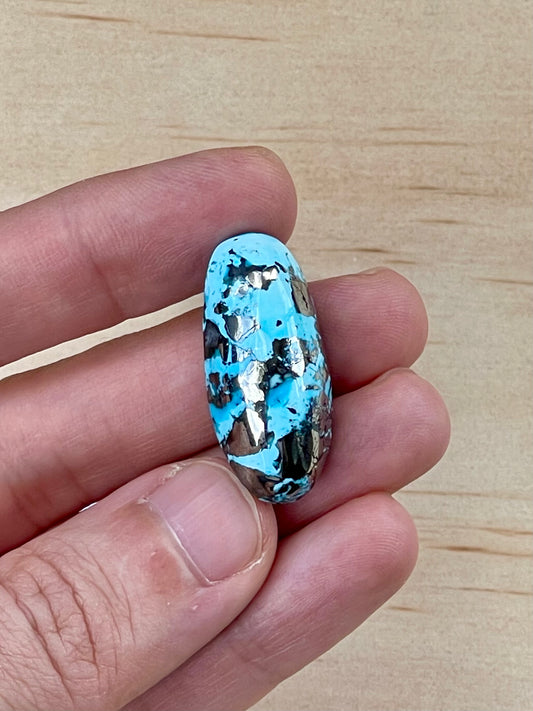Turquoise Cabochon from Kerman Mine, Iran. With Pyrite Crystals. #K1