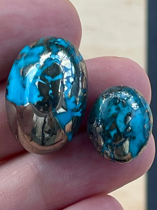 Two Stunning Turquoise Cabochon with Mirror Pyrite Crystals from Kerman Mine, Iran. (#K44)